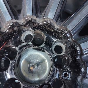 Photo of a tire that with broken wheel studs