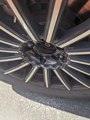 Photo of a tire a that with broken wheel studs