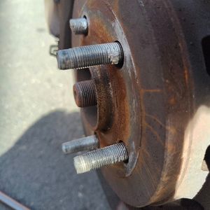 Photo of a tire a that with broken wheel studs